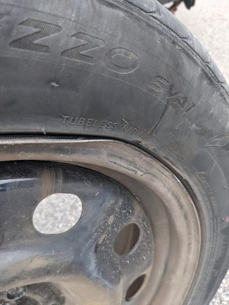 Wheel Pushed Back After Hitting Curb